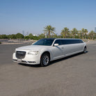 Chrysler White stretch limousine with chauffeur in Dubai