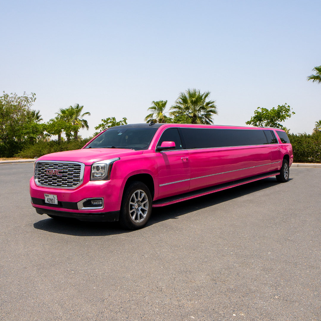 Pink stretch limousine with chauffeur in Dubai